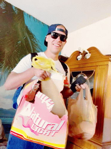 Man Holding Bag Saying Natural Light