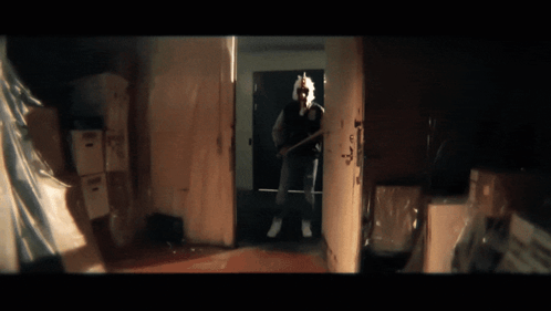 Man Holding Baseball Bat