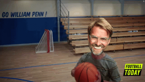 Man Holding Basketball Saying Go William Penn
