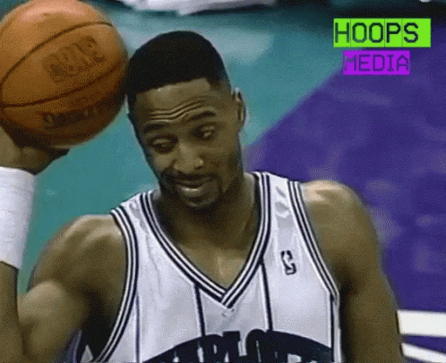 Man Holding Basketball Saying Hoops GIF