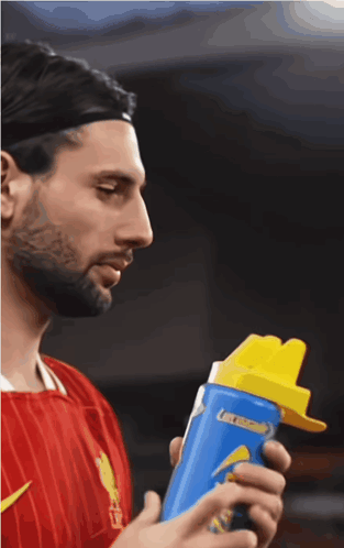 Man Holding Blue Bottle Of Gatorade GIF