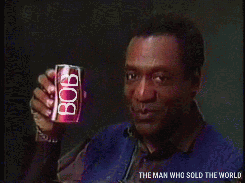 Man Holding Bob Soda Can