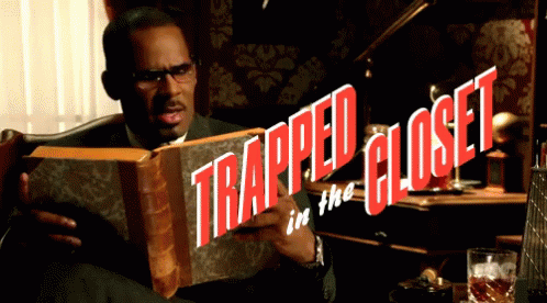 Man Holding Book Saying Trapped In The Closet GIF