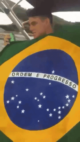 Man Holding Brazilian Flag Ordem E Progresso GIF