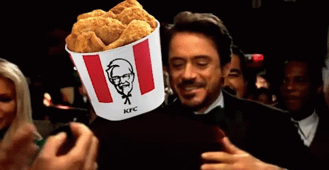 Man Holding Bucket Of KFC Chicken Nuggets Over Head GIF