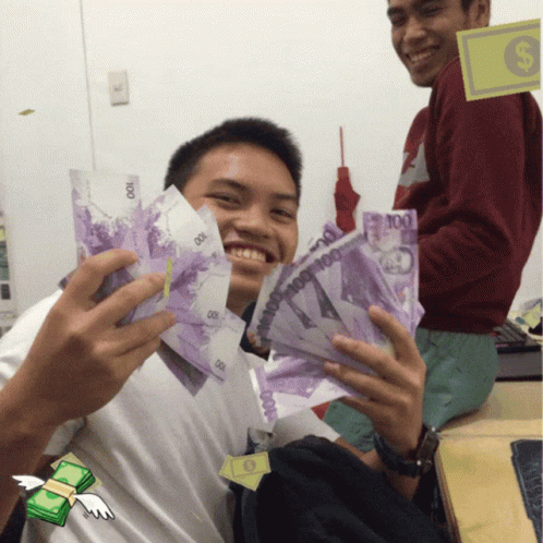 Man Holding Bunch of 100 Bills