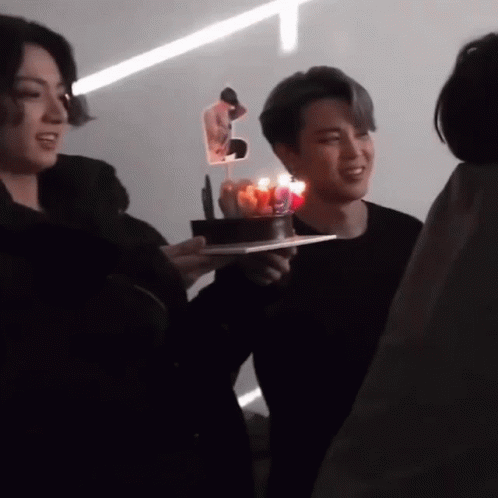 Man Holding Cake With Candles and Jimin Picture