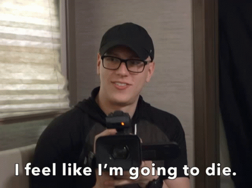 Man Holding Camera I Feel Like I'm Going to Die