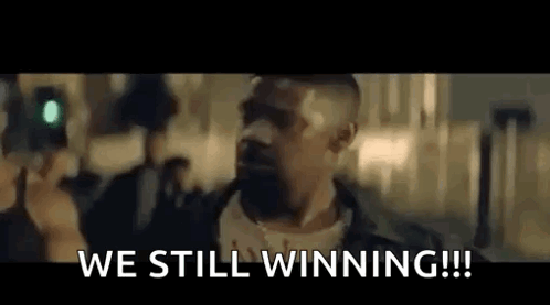 Man Holding Camera Saying We Still Winning