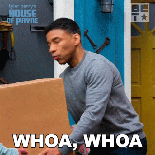 Man Holding Cardboard Box Saying Whoa Whoa