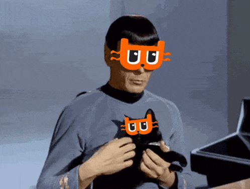 Man Holding Cat with UO Mask