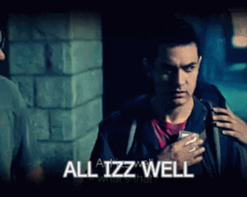 Man Holding Cell Phone Saying All Izz Well