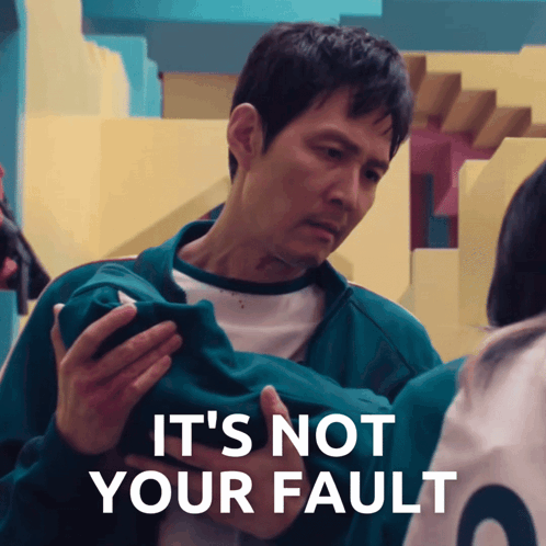 Man Holding Cell Phone Saying It's Not Your Fault GIF