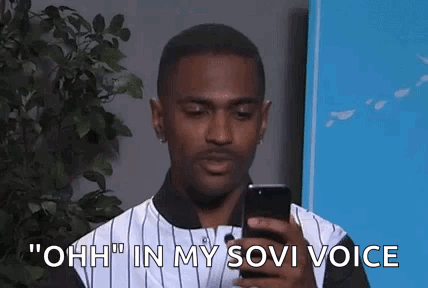 Man Holding Cell Phone Saying Ohh in Sovi Voice