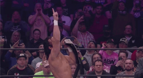 Man Holding Championship Belt