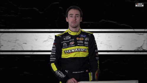 Man Holding Checkered Flag Saying Menards GIF