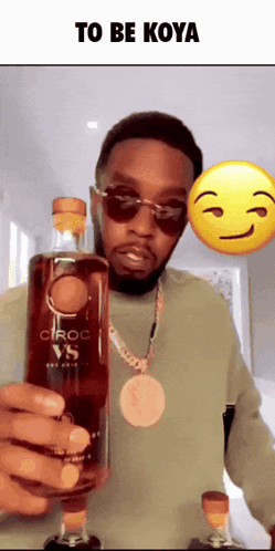 Man Holding Ciroc Bottle