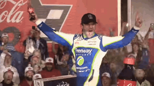Man Holding Coca Cola Bottle Before Crowd GIF