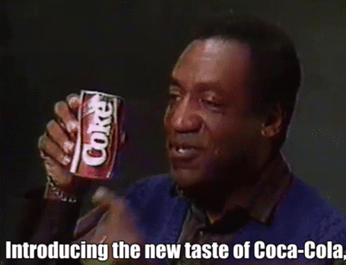 Man Holding Coca Cola Can Introducing New Taste