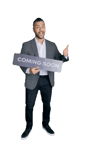 Man Holding Coming Soon Sign