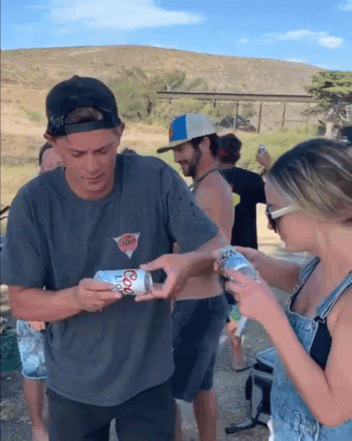Man Holding Coors Light Can Woman Looking On GIF