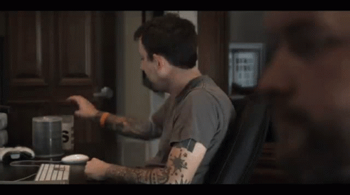 Man Holding Cup Saying Tips GIF