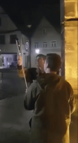 Man Holding Fireworks Firecracker Rocket GIF