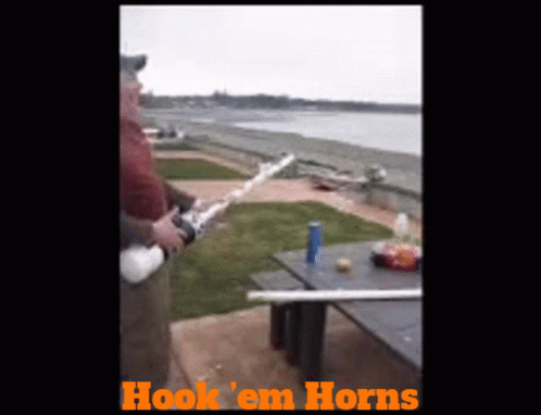 Man Holding Fishing Rod With Hook Em Horns