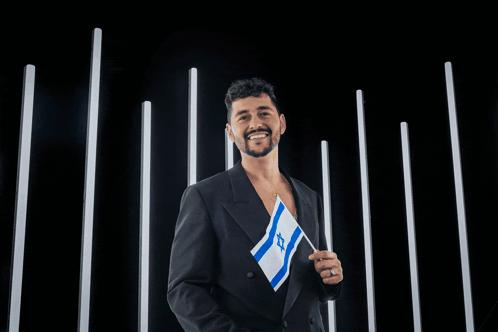 Man Holding Flag Noam Bettan Stands With Israel Banner