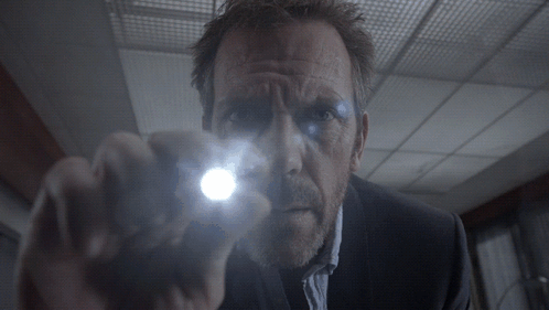 Man Holding Flashlight