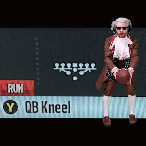 Man Holding Football in Front of Run Sign