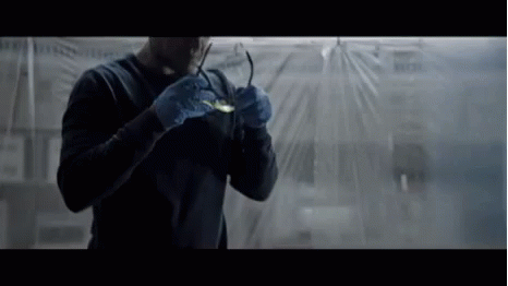 Man Holding Glasses GIF