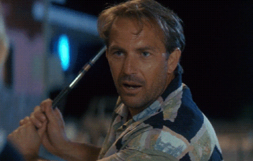 Man Holding Golf Club Saying Grip It
