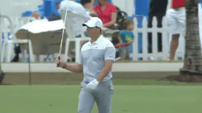 Man Holding Golf Club