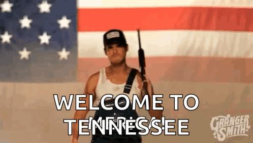 Man Holding Gun American Flag Welcome to Tennessee