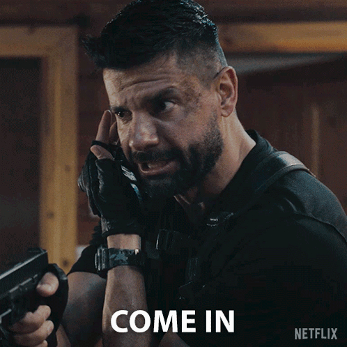 Man Holding Gun Come In