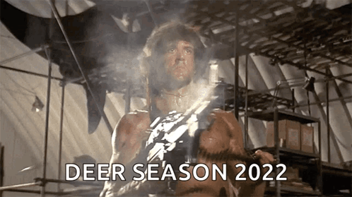 Man Holding Gun Deer Season 2022