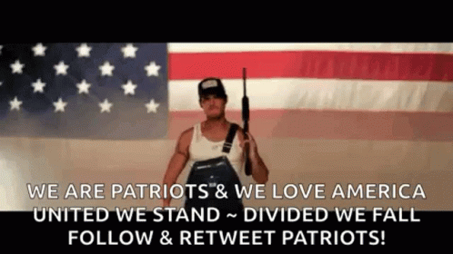 Man Holding Gun In Front Of American Flag Saying We Are Patriots And We Love America GIF