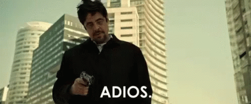 Man Holding Gun Saying Adios