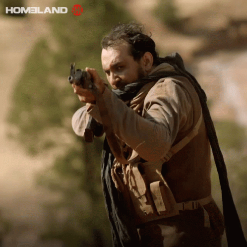 Man Holding Gun Saying Homeland GIF
