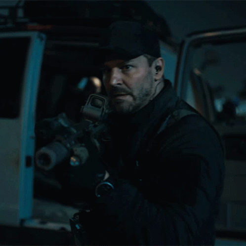 Man Holding Gun Saying Load Up