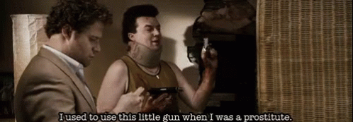 Man Holding Gun Says I Used To Use This Little Gun When I Was A Prostitute