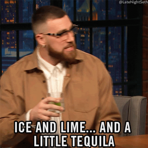 Man Holding Ice Lime and Tequila