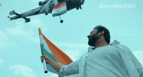 Man Holding Indian Flag Next To Army Helicopter GIF