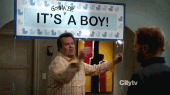 Man Holding It's A Boy Sign GIF