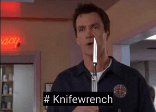 Man Holding Knife with #Knifewrench