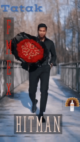 Man Holding Large Red Bouquet With Hitman