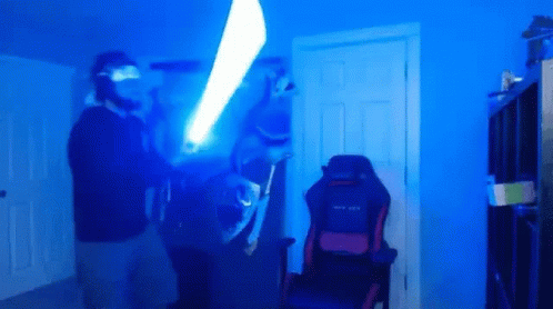 Man Holding Light Saber
