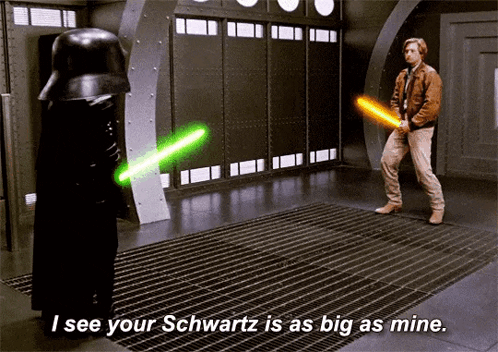 Man Holding Lightsaber Saying I See Your Schwartz Is As Big As Mine