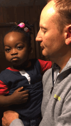 Man Holding Little Girl in Grey SEO Sweatshirt